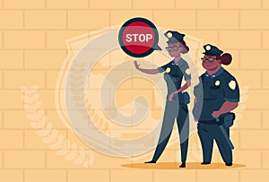 Two African American Police Women Holding Stop Sign Wearing Uniform Female Guards On Blue Bricks Background
