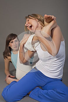 Two aggressive women fighting