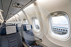 Two Airplane Windows - Jet Interior