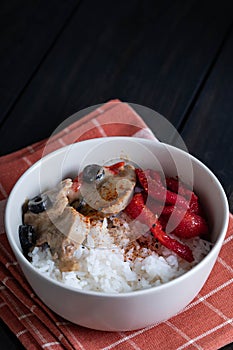 Creamy mushroom lengua and tocino on topped of rice photo