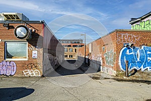 Two Alley-way crossing covered with graffiti in Montreal borough of Hochelaga Maisonneuve