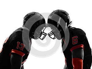 Two american football players face to face silhouette