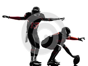 Two american football players on scrimmage silhouette