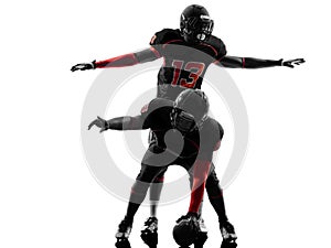 Two american football players on scrimmage silhouette