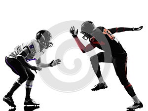 Two american football players on scrimmage silhouette