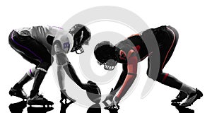 Two american football players on scrimmage silhouette photo