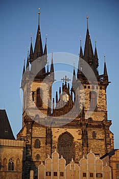 Two ancient towers of Tynsky chram on the Old Town Square (Staromestske namesti) during the sunset photo