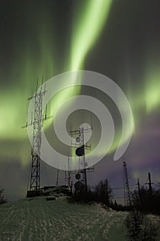 Two antennas under two aurora arcs