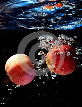 Two apple in water
