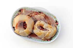 Two apples with jam baked in the oven