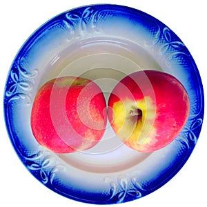 Two apples on the saucer