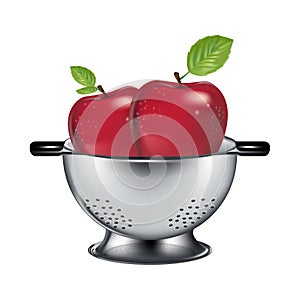 Two apples in steel drainer isolated