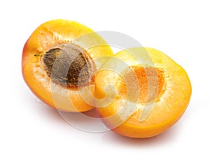 Two apricot halves with stone photo