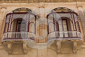 Two Art Nouveau balconies on the streets of Valletta