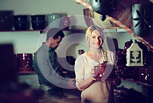 Two artisans having ceramics