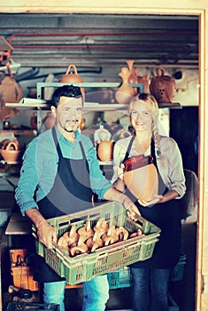 Two artisans having ceramics