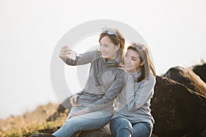 Two Asia woman Friends taking selfie