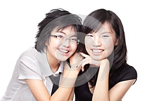 Two Asian Chinese girls sharing a bonding moment