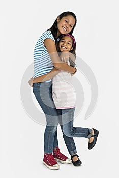 Two Asian Girl Sisters Hugging Togetherness Concept