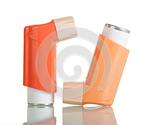 Two asthma inhaler isolated on white background.