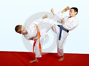 Two athletes doing sports paired exercises