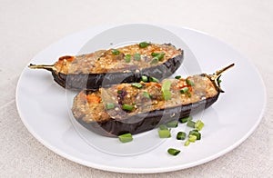 Two Aubergines Stuffed with Cheese and Mushrooms