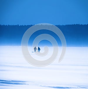 Two fishermen. Ice fishing