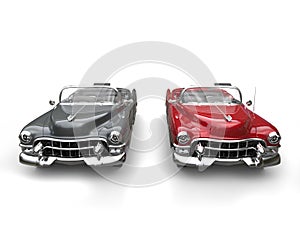 Two awesome black and red vintage cars