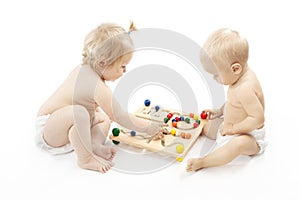 Two babies playing game white background