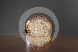 Stylish dining room interior. Dining table and chairs on wall background