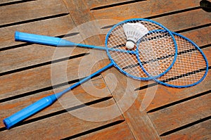 Two badminton rackets and shuttlecock