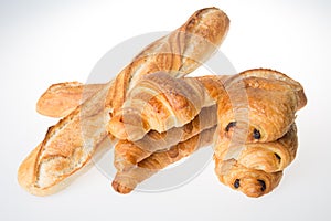 Baguettes croissants and breads chocolates concept of french bakery