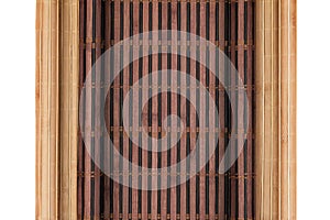 Two bamboo mat twisted in the form of manuscript isolated on white background