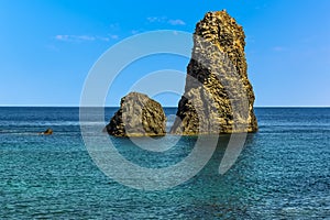 Two Basalt Stacks offshore at Aci Trezza, Sicily