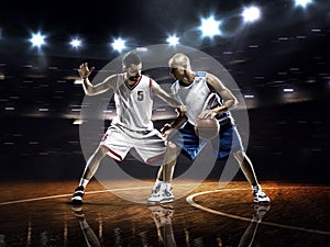 Two basketball players in action