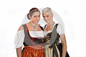Two bavarian girls in traditional costumes