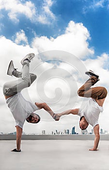 Two Bboy doing stunt at the roof
