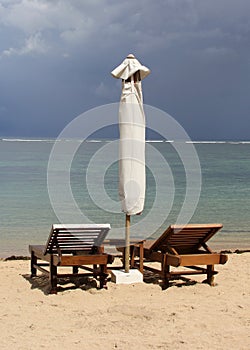 Two beach chairs along the ocean, destination scenics