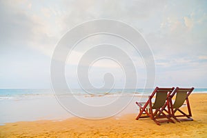 Two beach chairs on the beach