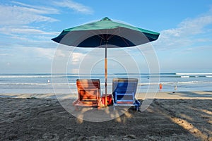 Two beach chairs on the beach