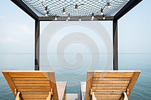 Two beach chairs on the terrace