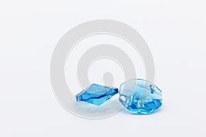 Two beautiful blue crystals in plastic