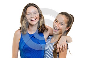 Two beautiful girls smile with perfect white smile, isolated on white background