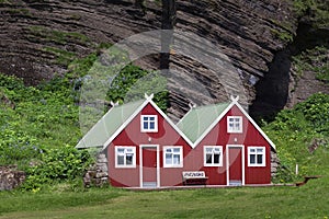 Two beautiful scandinavian red houses in Iceland