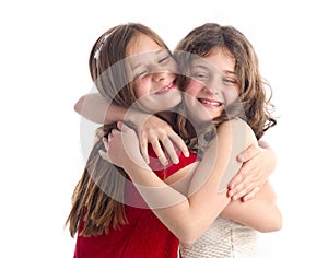 Two Beautiful Sisters hugging isolated