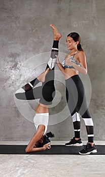 Two beautiful young Asian women at the gym