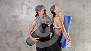 Two beautiful young Asian women at the gym