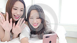 Two beauty woman selfie happily