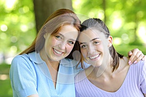 Two beauty women smiling at camera