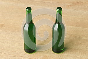 Two beer bottles 500ml mock up on wooden background